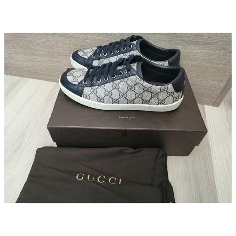 navy blue Gucci sneakers